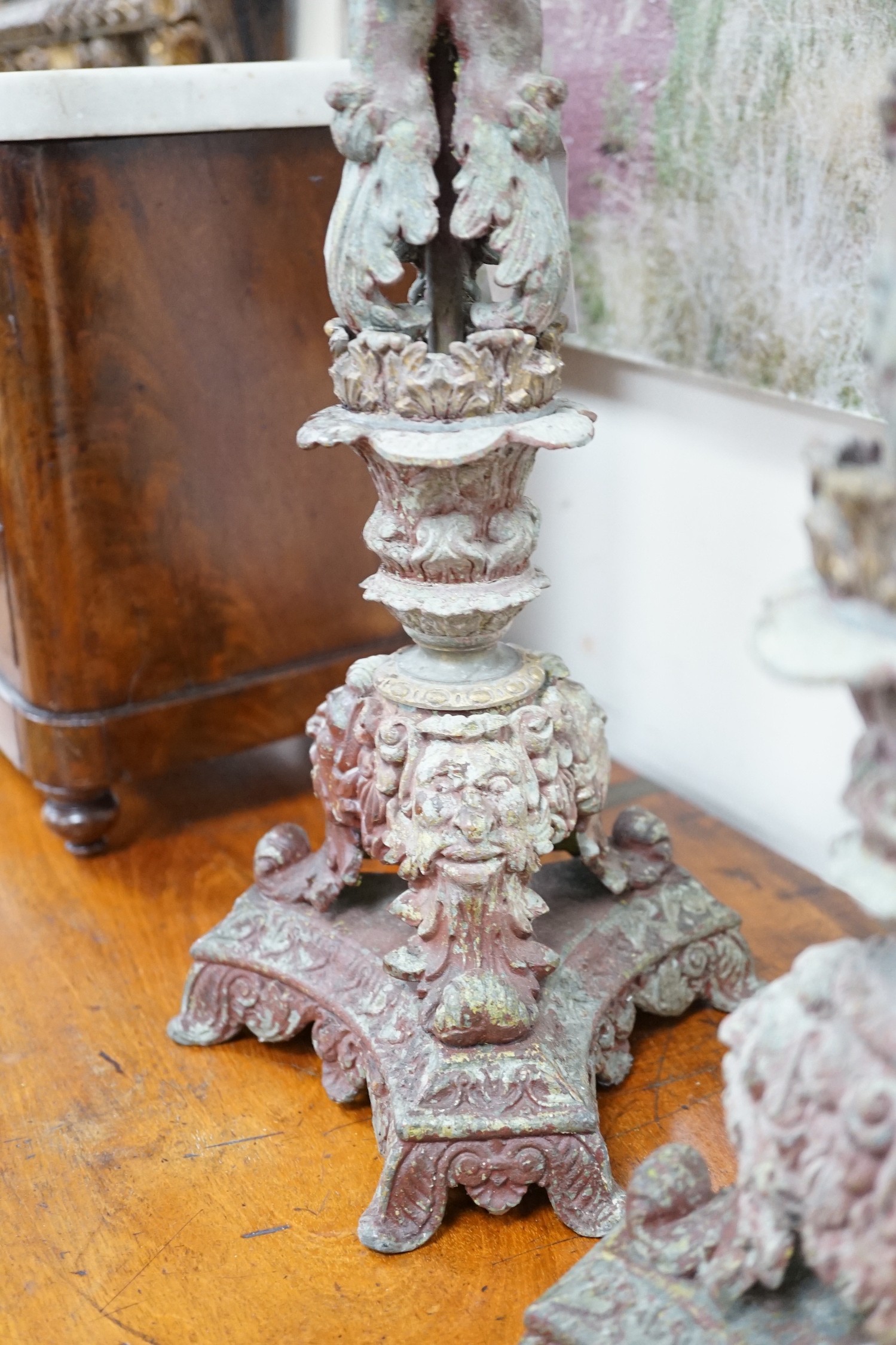 A pair French cast metal candlesticks. 47cm tall